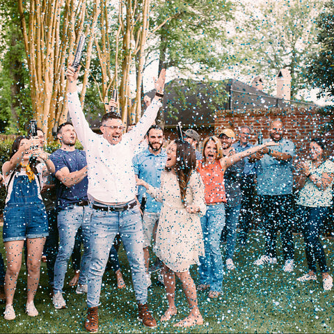 Confetti Powder Cannon Poppers at a Gender Reveal Party