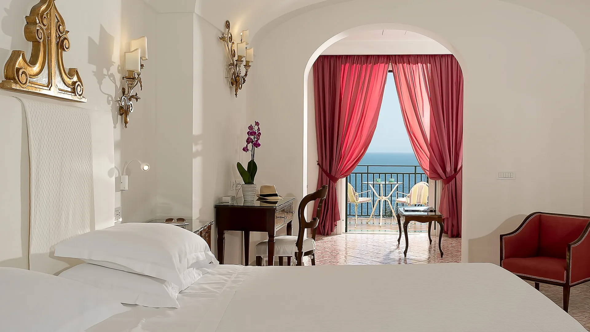 Luxury bedroom at the Hotel Santa Caterina, along the coast of Italy with a seaside view 