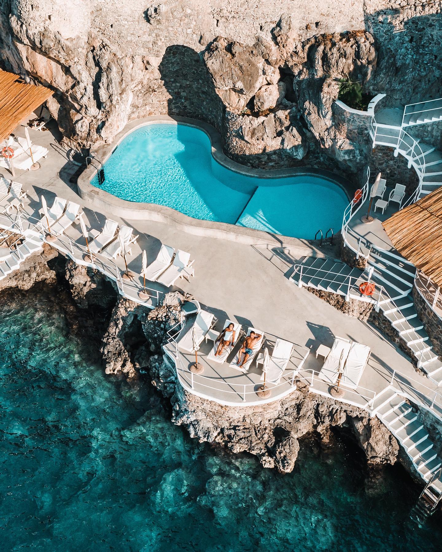 Stunning and luxurious pool area on a cliffside setting at the Hotel Santa Caterina in the Amalfi Coast