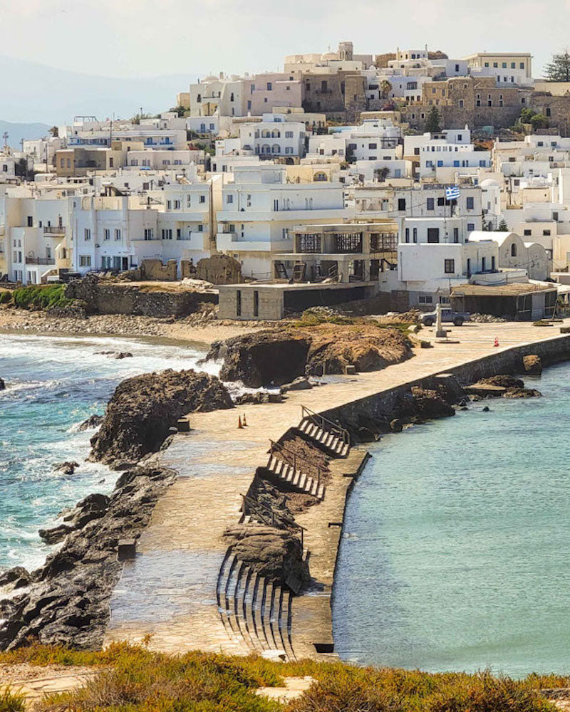 Picturesque village in Naxos, Greek Island, featuring iconic white buildings and unspoiled beauty