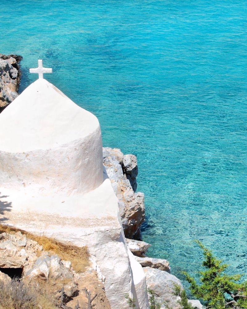 Calm and crystal-clear blue waters in Naxos, Greek Island