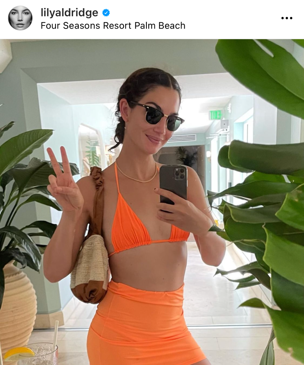 Lily Alridge seen wearing mini skirt sarong wrap skirt in selfie