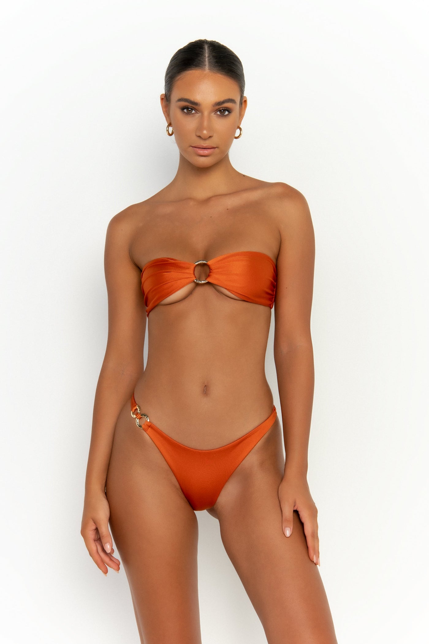 Model wearing the Rylee balconette bikini top in turmeric