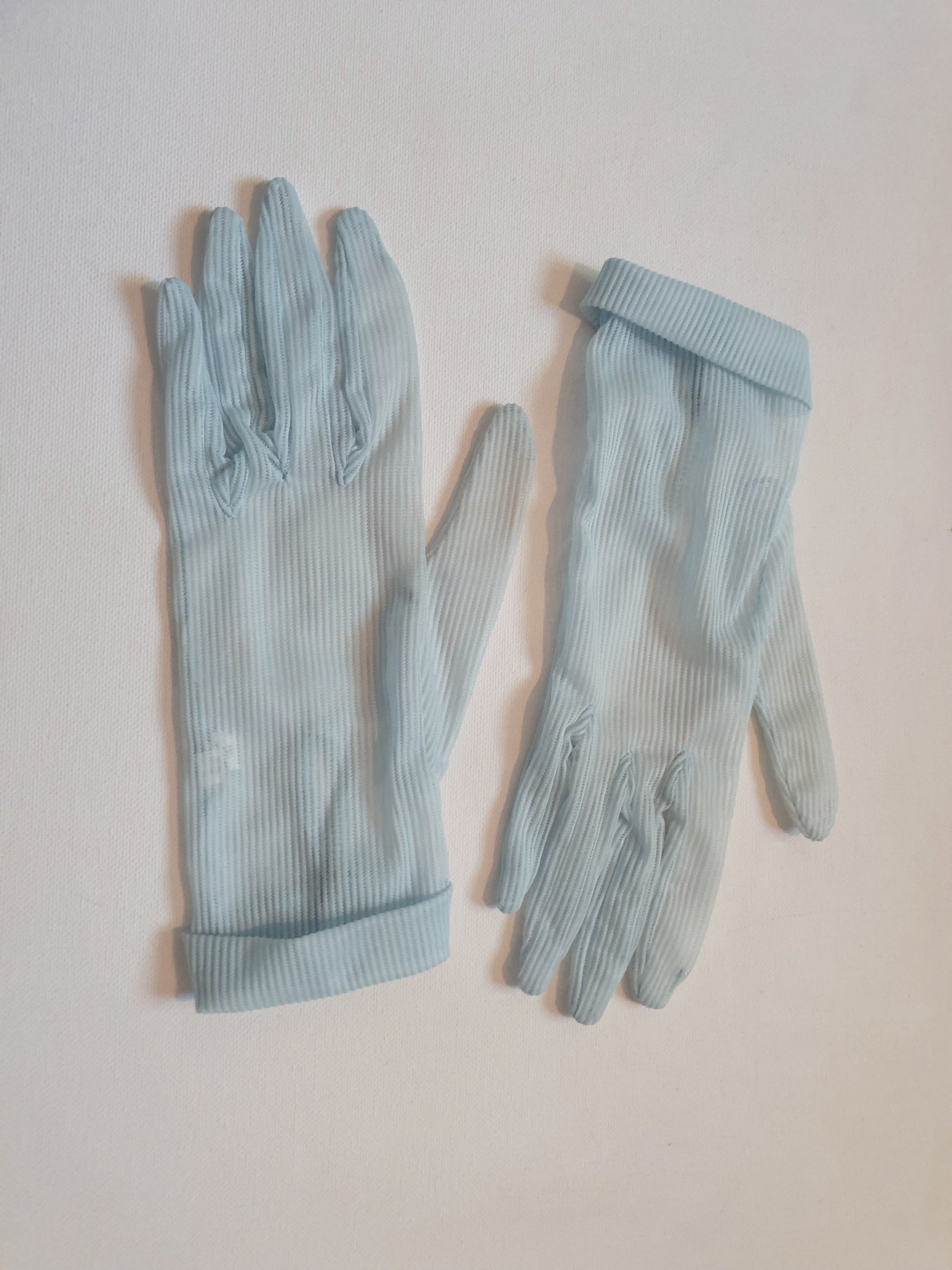 sheer blue gloves