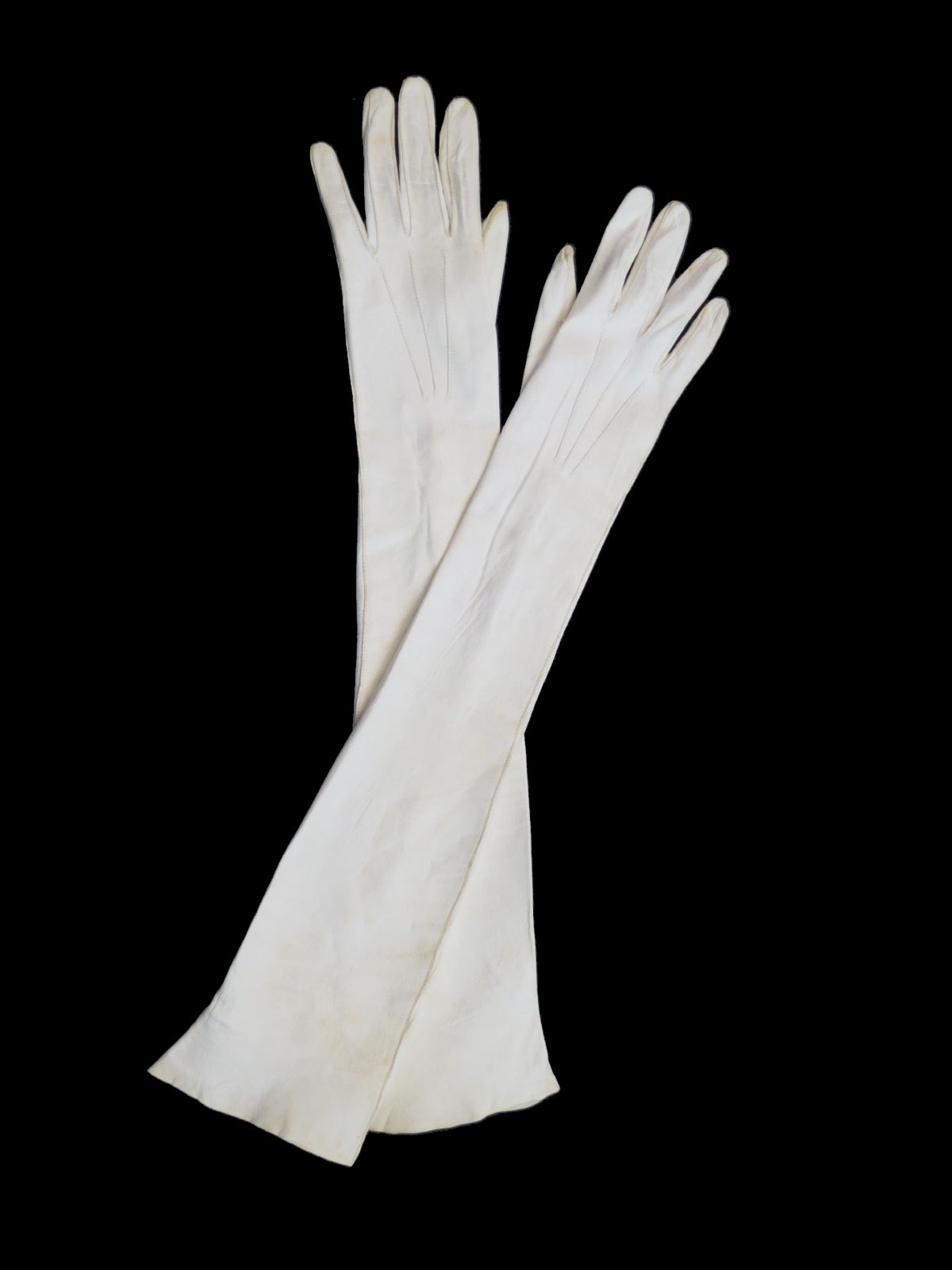 above elbow length ivory kid leather evening gloves 1950s