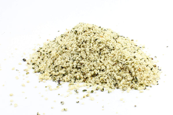 a pile of beige and green hemp seeds