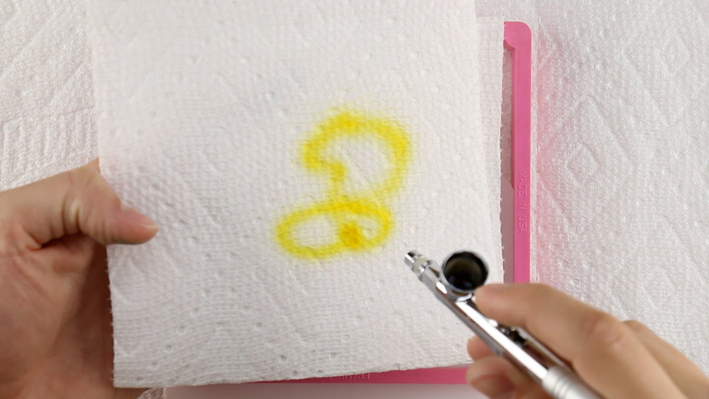 Load Amerimist into the Stencil Genie and test it on paper towel