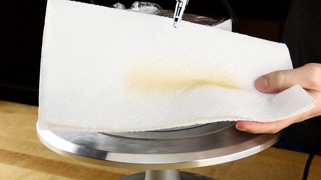 Test the airflow of the spray on a piece of paper towel