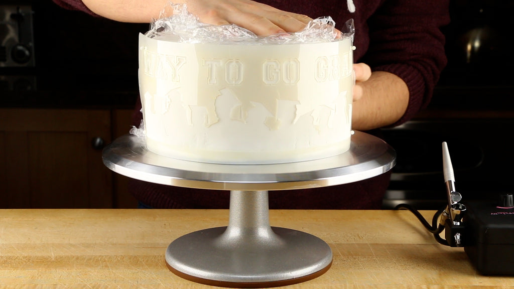 Cover the rest of the cake with saran wrap