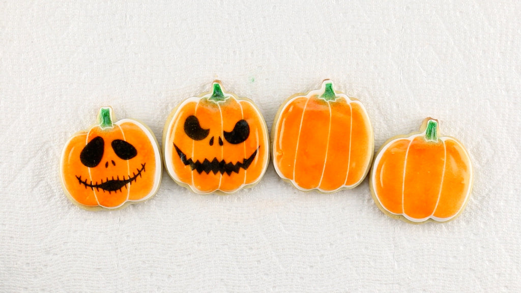 Airbrush Jack-O-Lantern face onto as many pumpkins as you'd like
