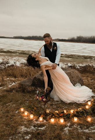 A wedding in a rural setting, inspired by the men's Viking wedding rings that are popular in the modern day