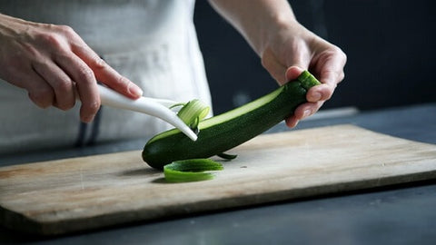 peeling zucchini