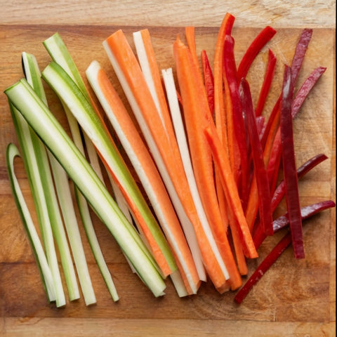 julienned veggies on a cutting board