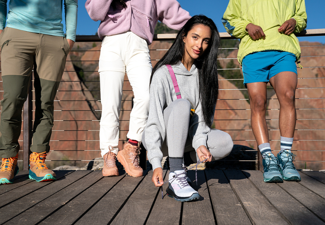 Group of hikers wearing Feetures trail socks and hiking shoes