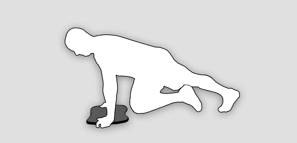 silhouette of man doing mountain climbers on stability board