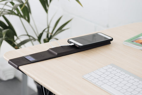 USB charger on standing desk