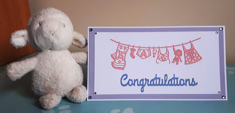 Congratulations on your baby card using die cuts and double sided adhesive sheets