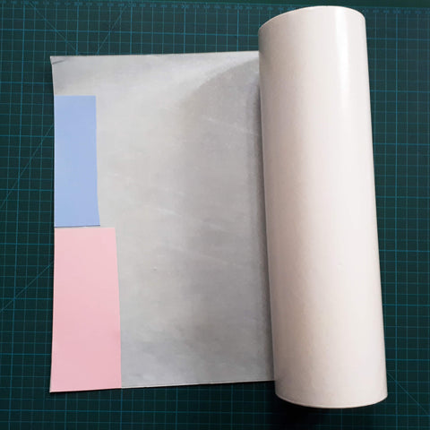 Place your card on to double sided adhesive sheet Sticky Roll