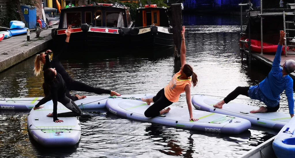 paddleboarding yoga