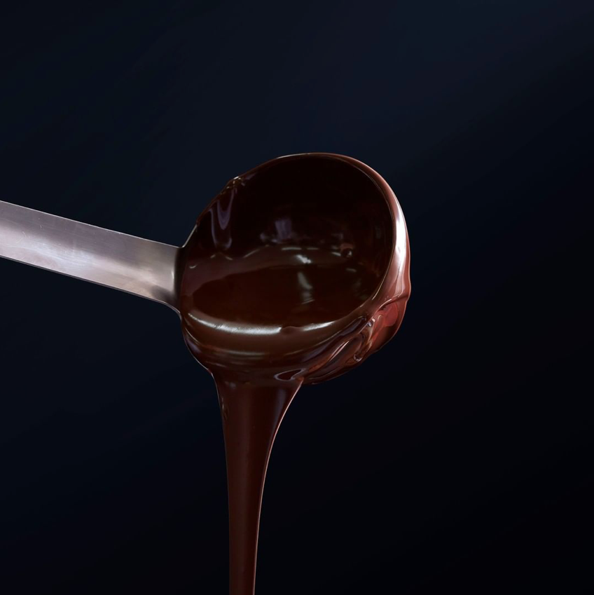chocolate pouring from ladle