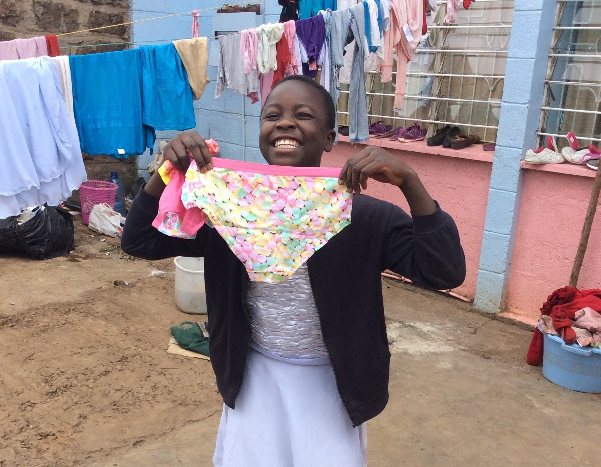 Smiling girl with underwear
