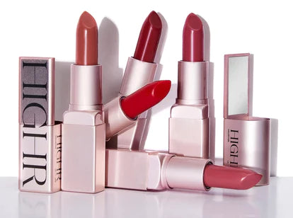 Various lipsticks in pink packaging