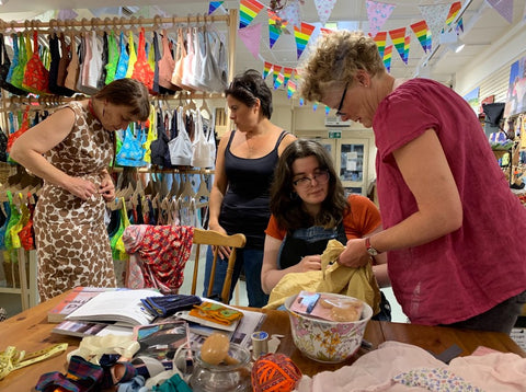 Group of people in our mending workshop