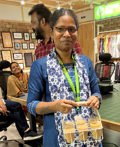 Lady with glasses of chai