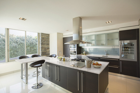 Kitchen Islands – Granite & Quartz countertops. Kitchen cabinets