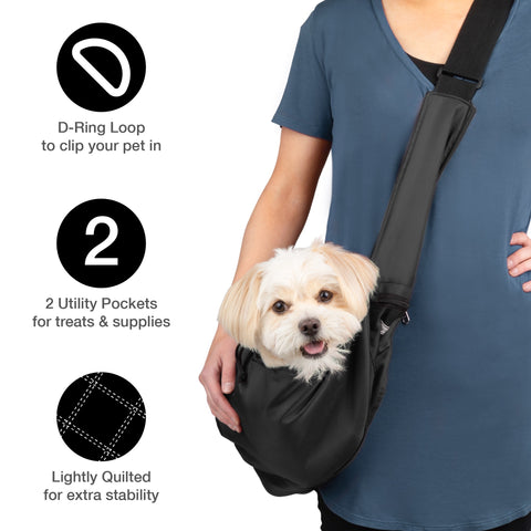 womn carrying small dog in sling carrier with feature icons