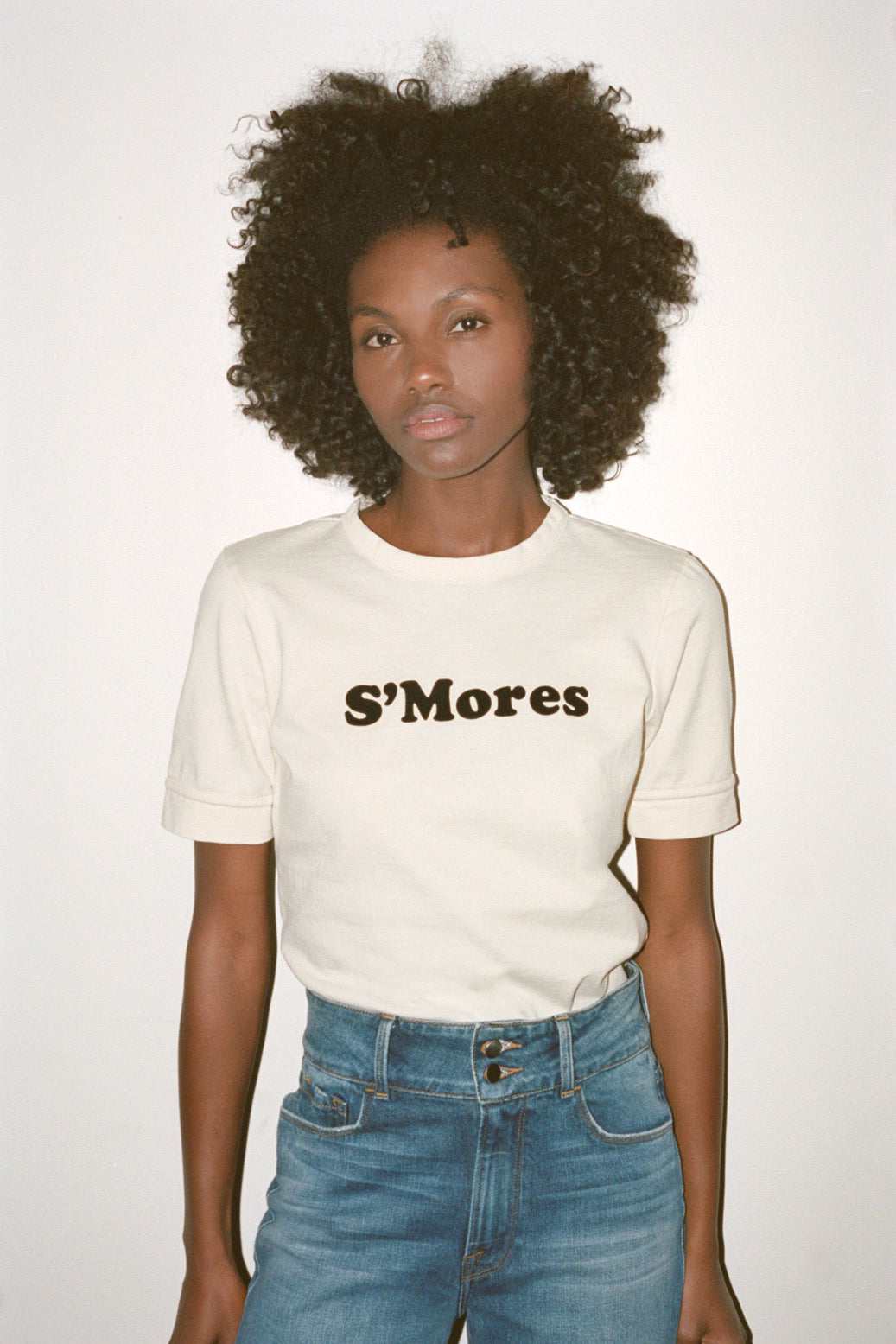Top: product:smores-tee-off-white, Jeans: product:slim-palazzo-montauk