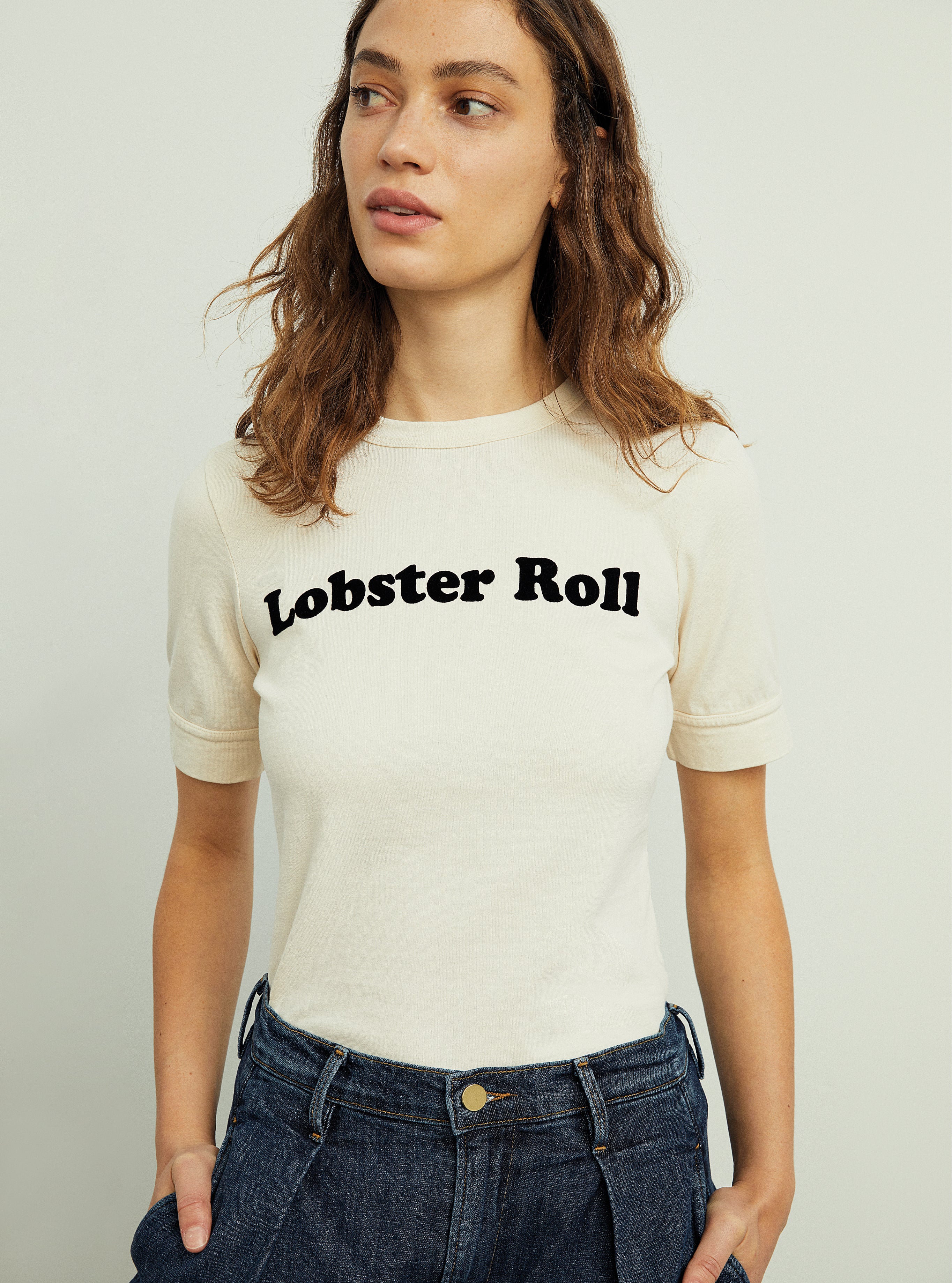 Top: product:lobster-roll-tee-off-white, Jeans: product:deep-pleat-crop-palazzo-galileo