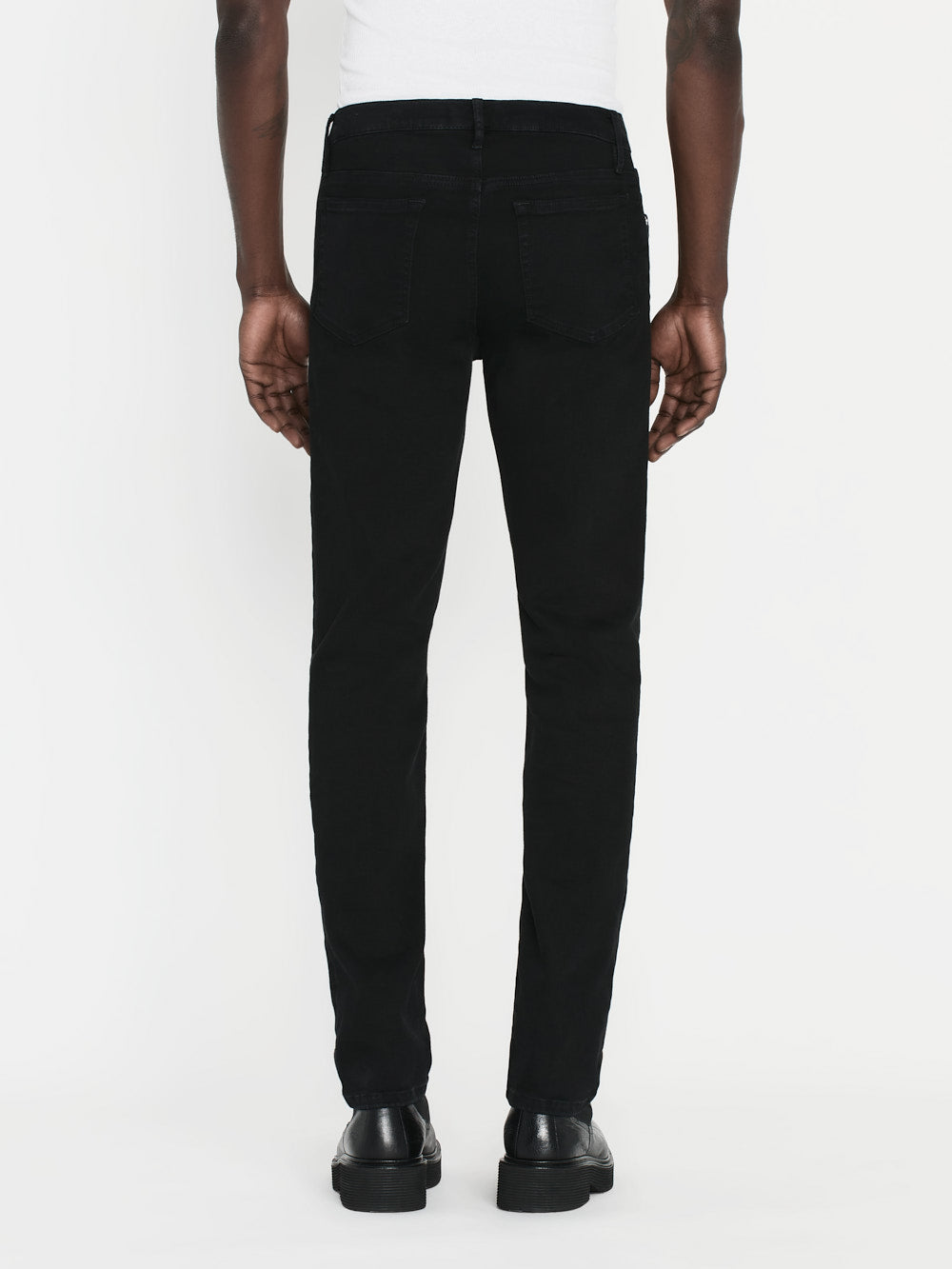 Shop Frame Jetset Modern Straight Jeans In Black