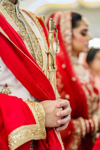 Crafting the groom's vision: Our bespoke Indian wedding attire.