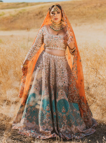 Graceful and regal: The perfect union of Indian bridal lehenga and veil.