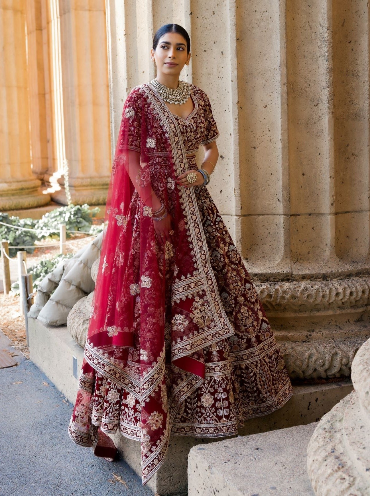 Maroon & Gold Heavy Gold Embroidered Maroon Bridal Lehenga by HER CLOSET  for rent online | FLYROBE