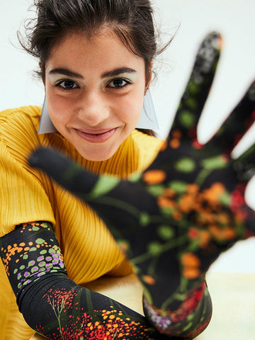 Kyndra Sanchez from the Baby-Sitters Club in WOLL earrings and Dried Van Noten Gloves