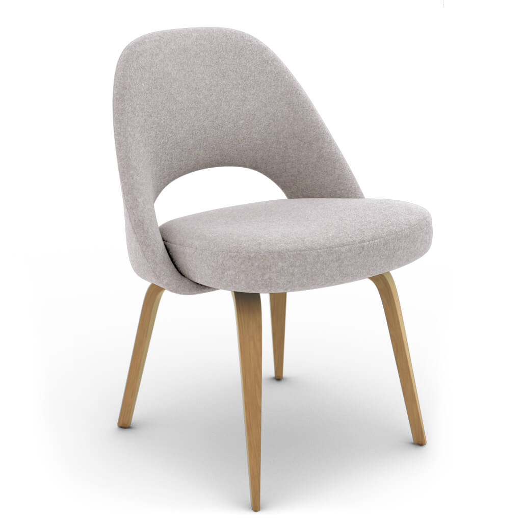 Grey Chair With Wooden Legs  : It Stands Out For Its Curved And Soft Contours And Is Exceptionally Comfortable, Thanks To The Padded And Shaped Backrest That Pleasantly Welcomes Your Back.