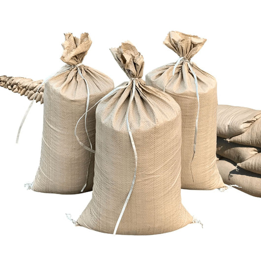 https://cdn.shopify.com/s/files/1/2262/3251/files/14x26-empty-beige-sandbags_530x.jpg?v=1693334282