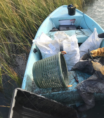 18x30 heavy duty sandbags filled with oysters in a fishing boat