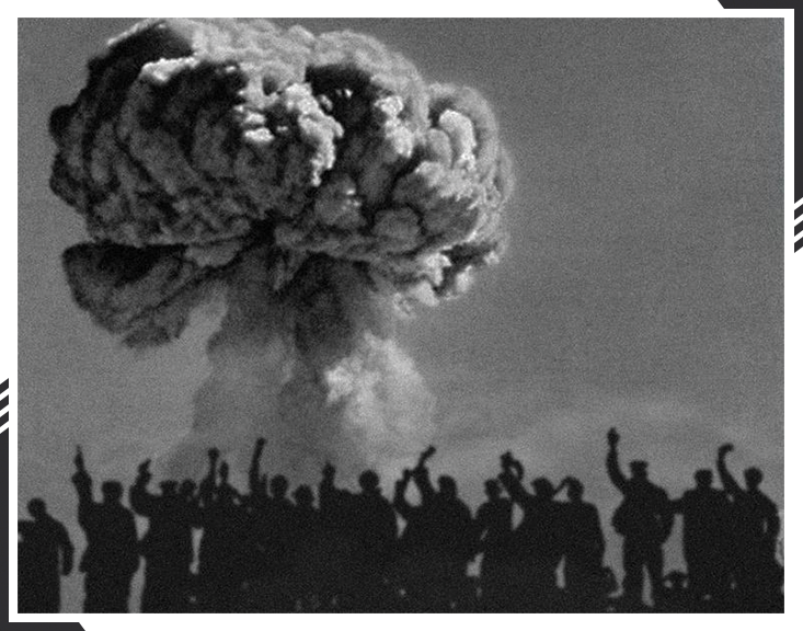 Soldiers silhouetted against mushroom cloud