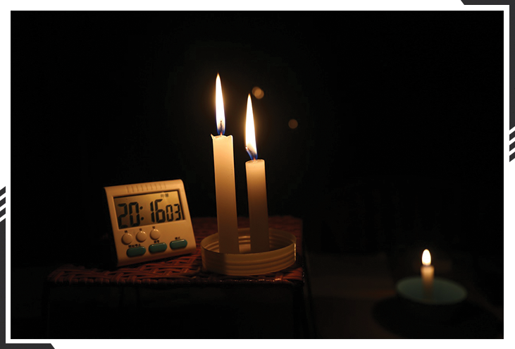 candles next to clock