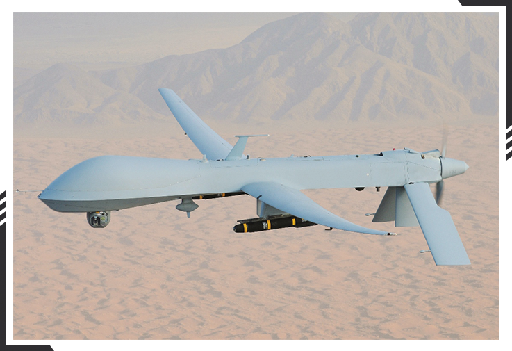 An MQ-1 predator drone flying over a vast desert