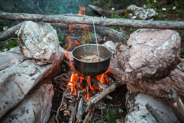 Making food at a wilderness camp