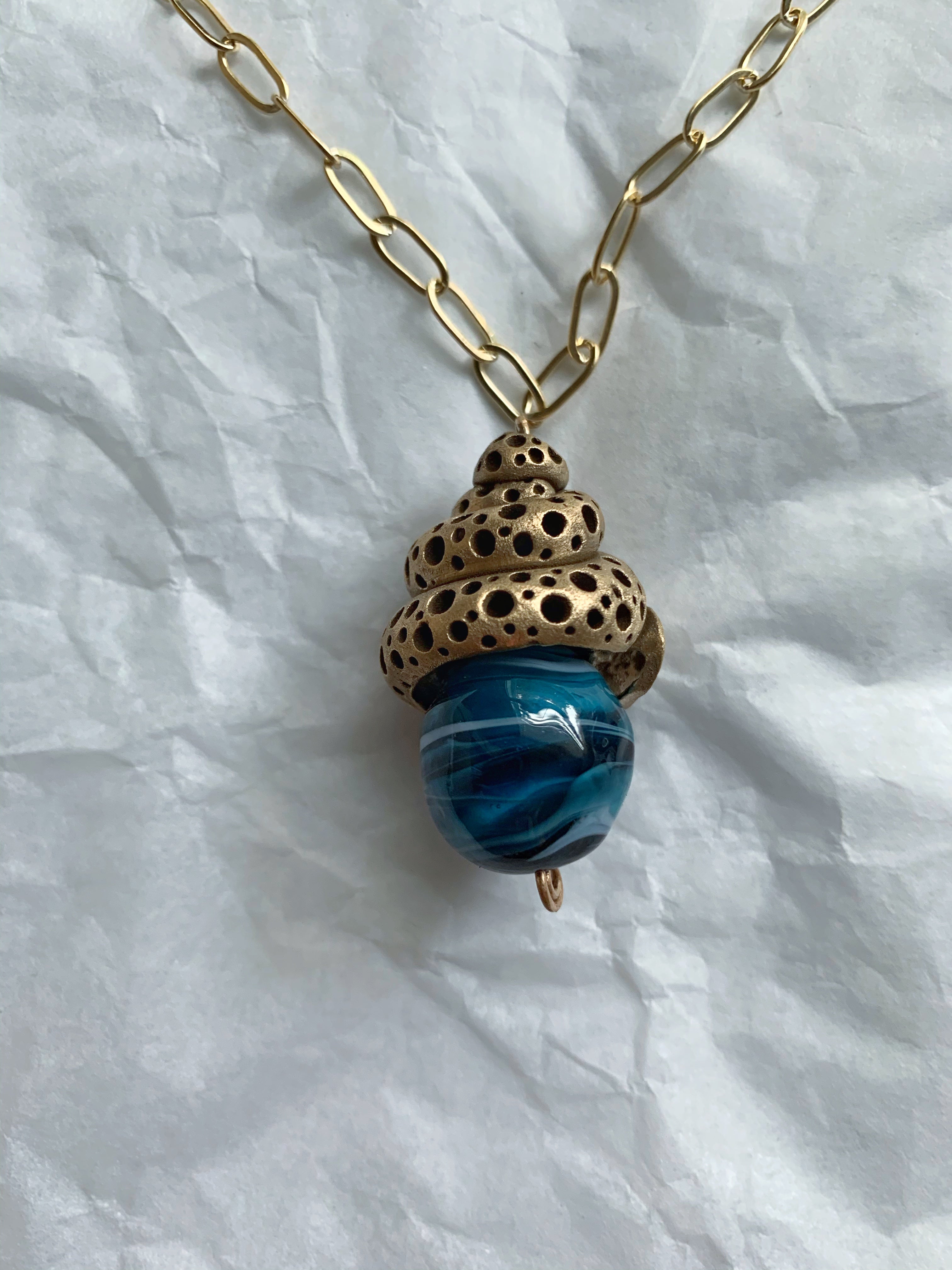 Artisan made ocean inspired bronze and glass necklace