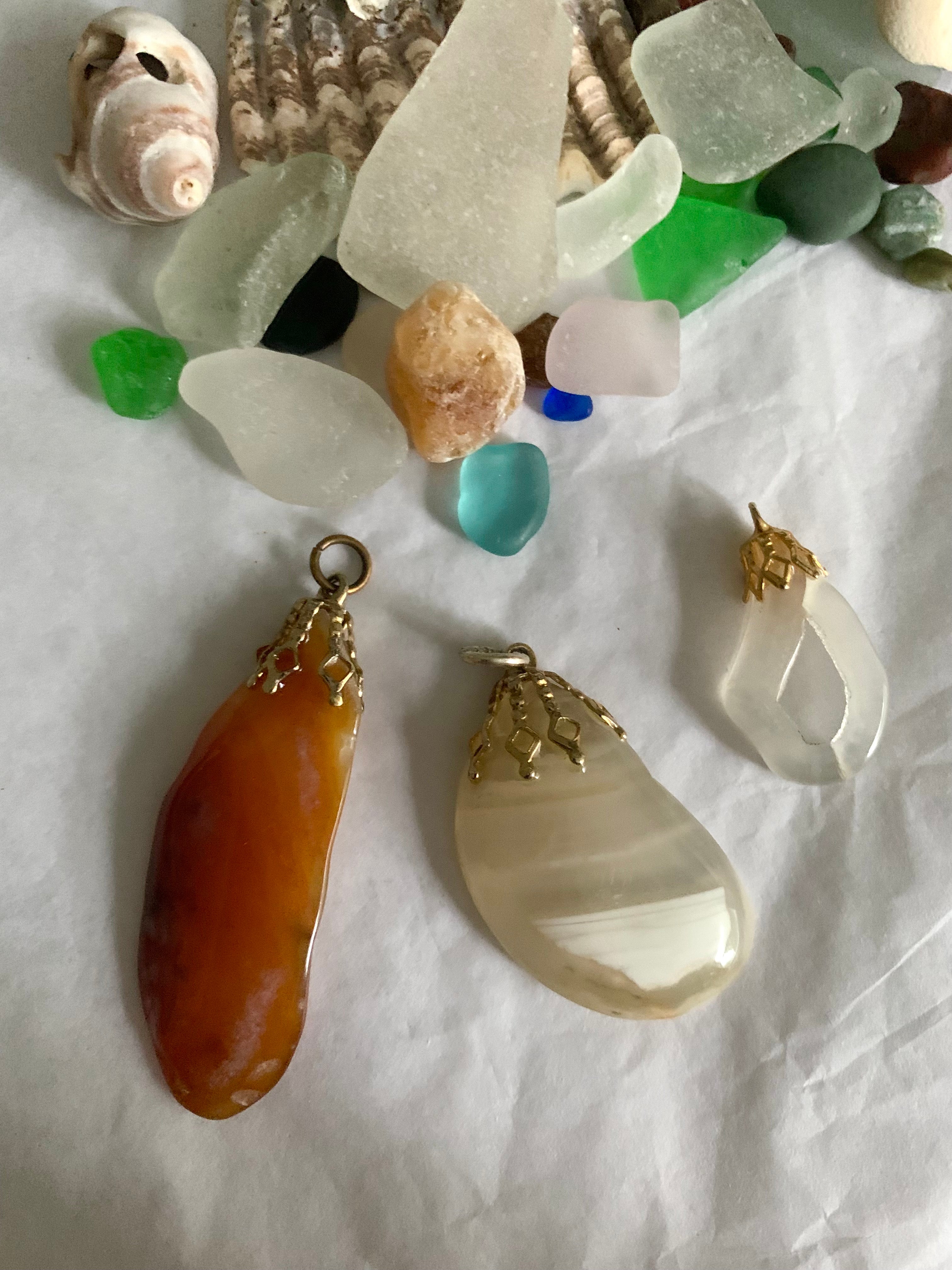 Various agates found on beach and made into jewelry pieces