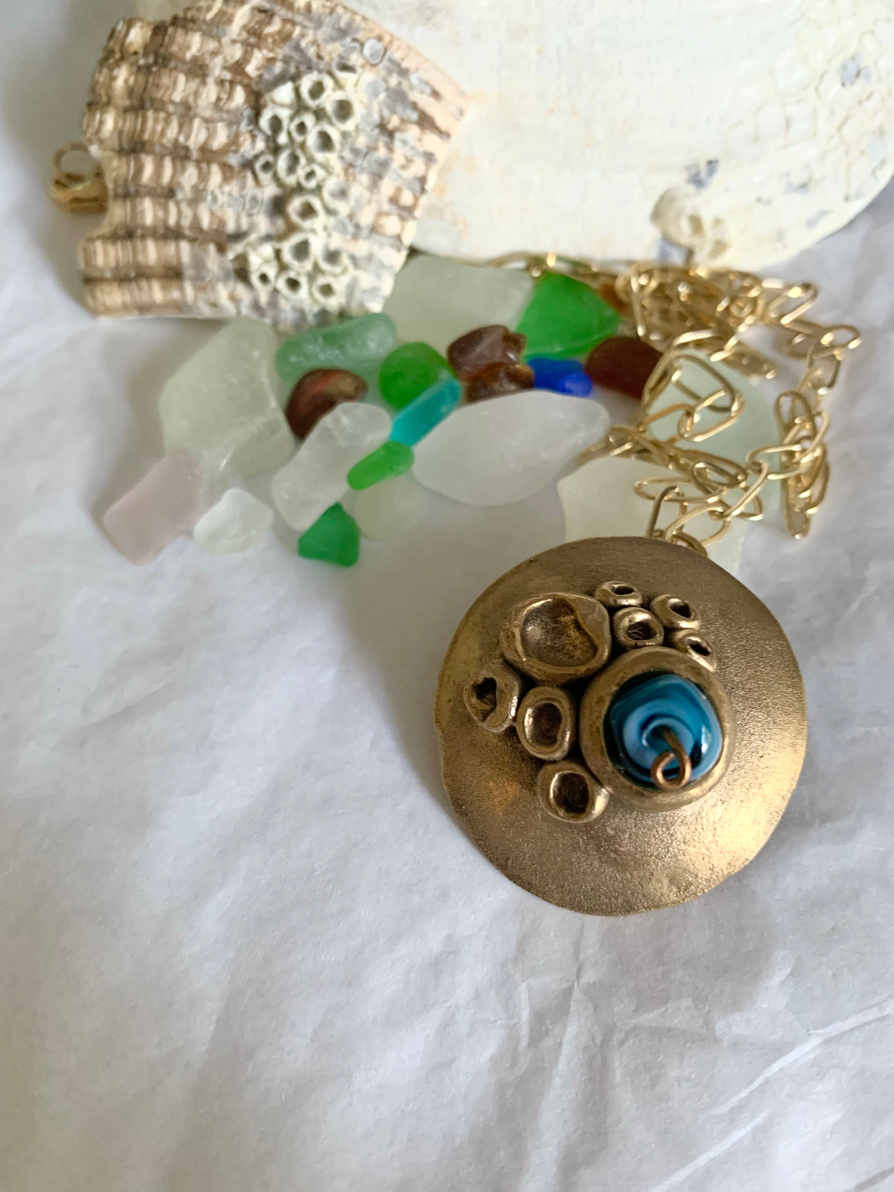 Bronze one of a kind necklace with beach treasure