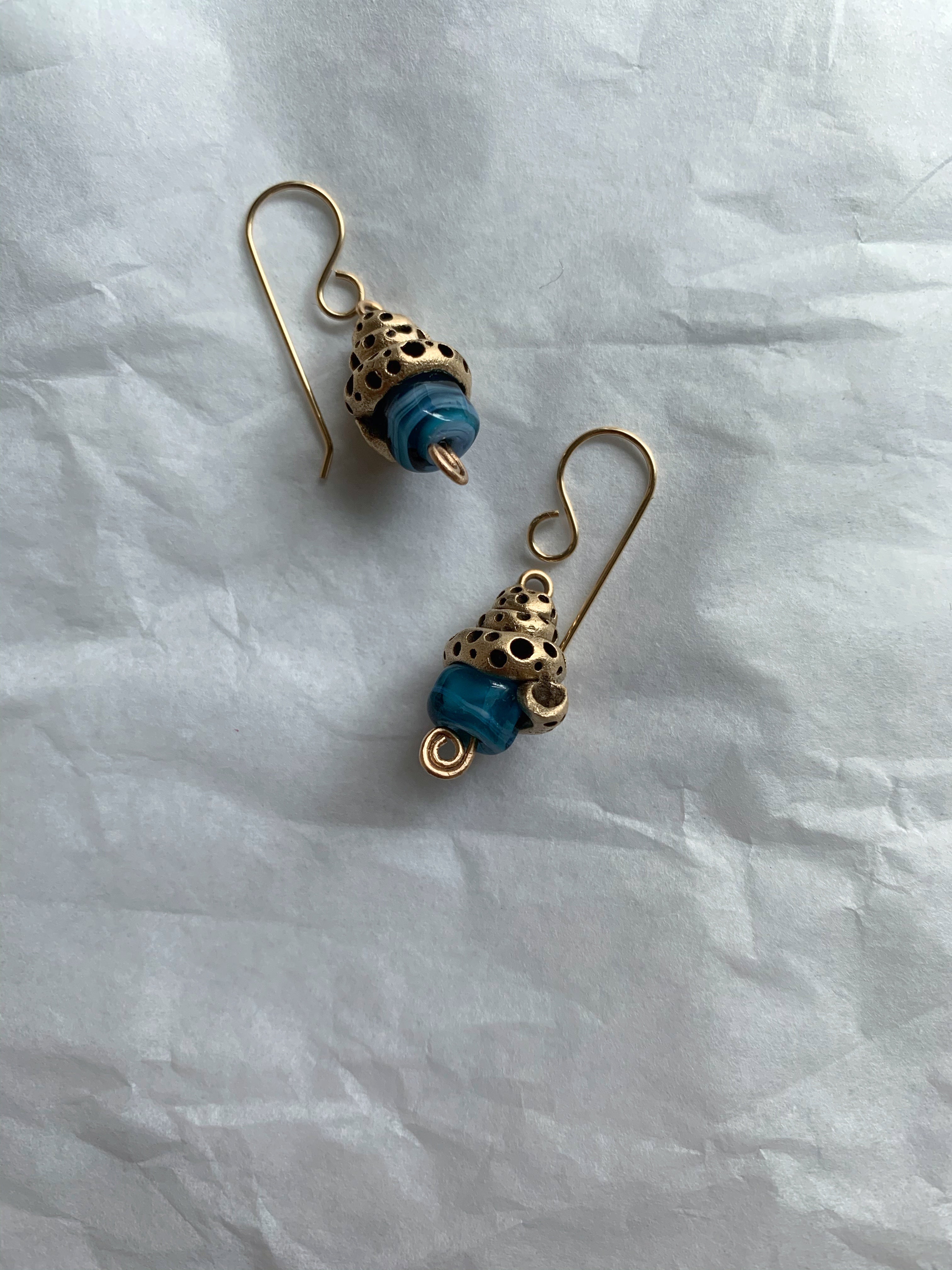 Art jewelry earrings made from bronze and blue glass