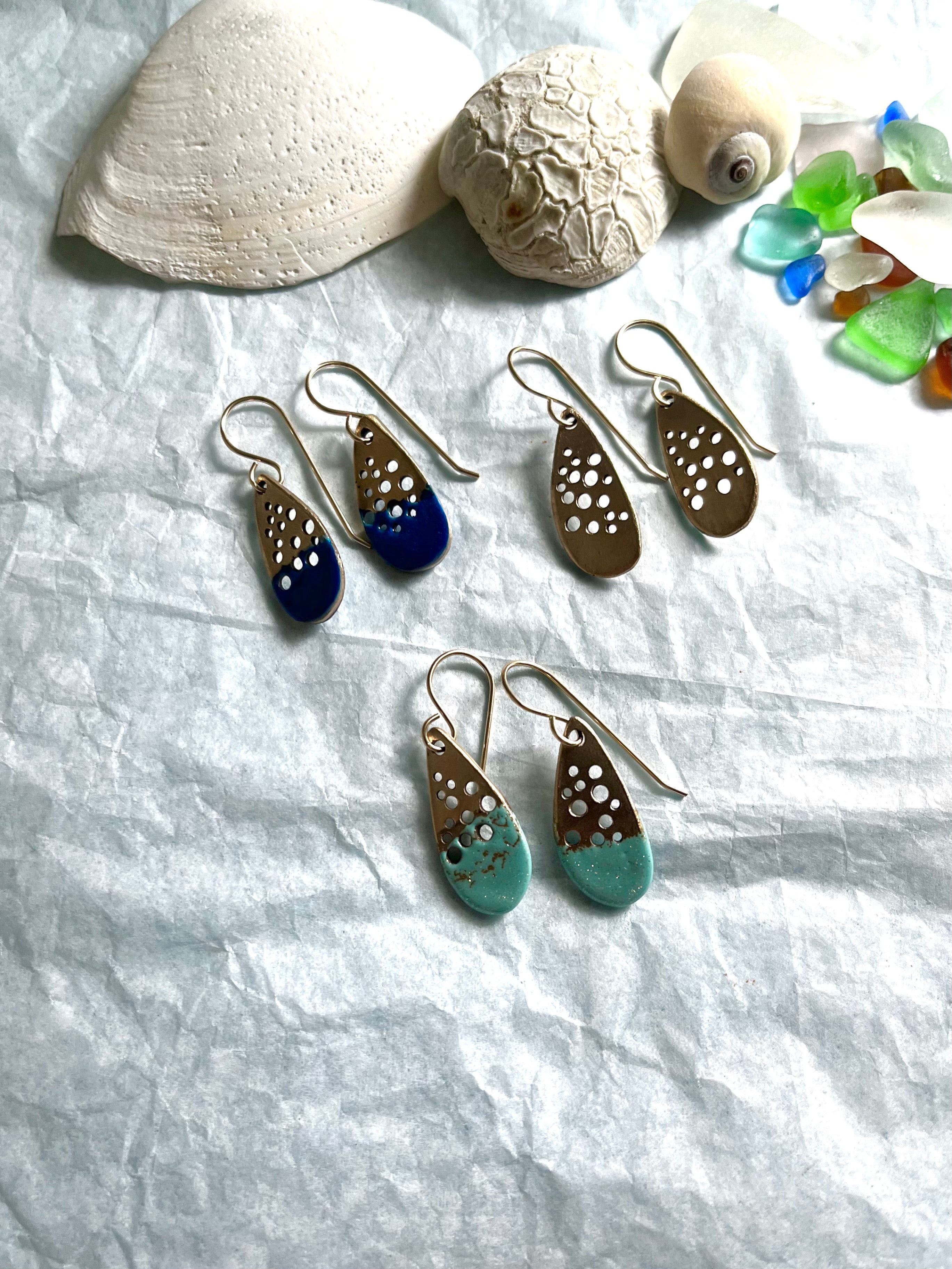 Artisan made earrings with seaglass and sea shells