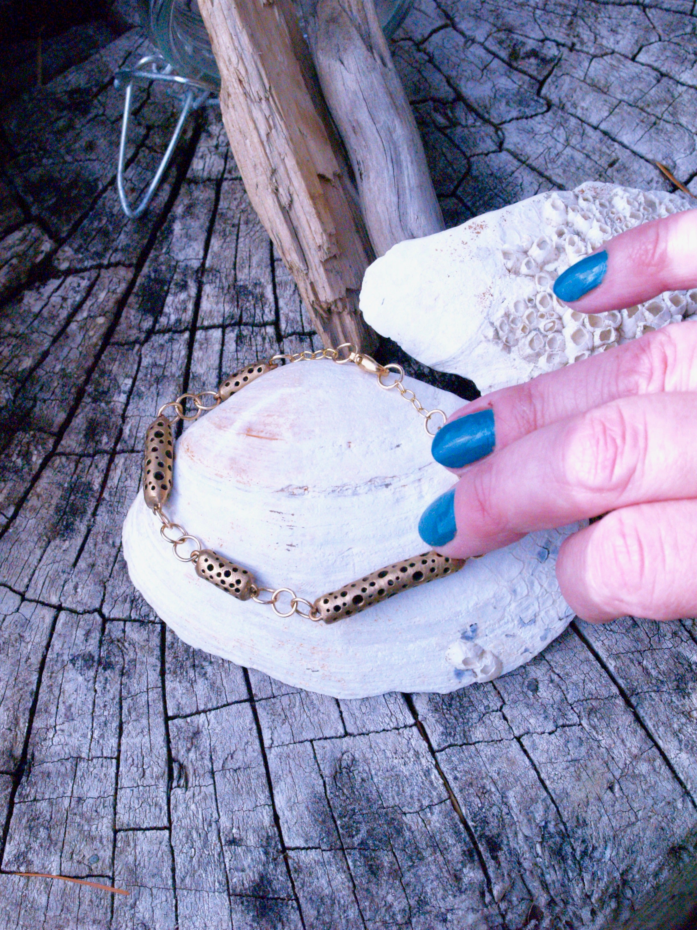 Blue nails, seashells and bronze artisan bracelet